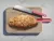 TREBONN Artú Bread 1120101 természetes fa - rózsaszín csúszásmentes vágódeszka beépített késsel